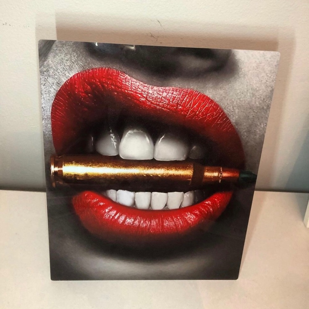 Lip art pedestal desk art.